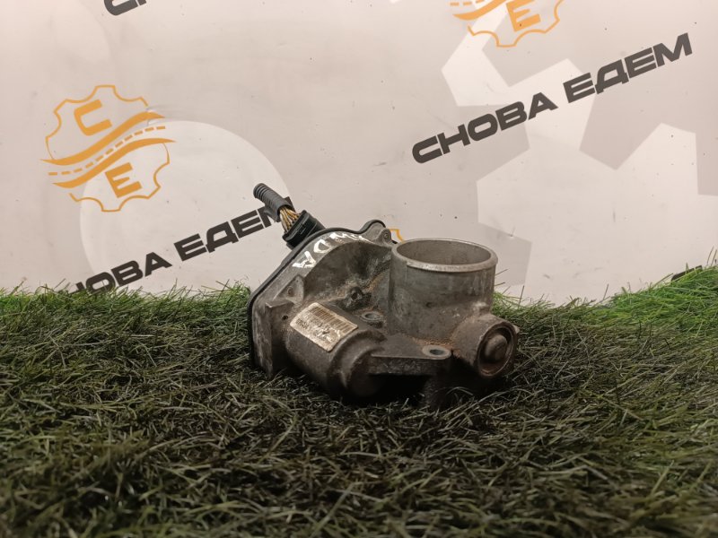 Дроссельная заслонка