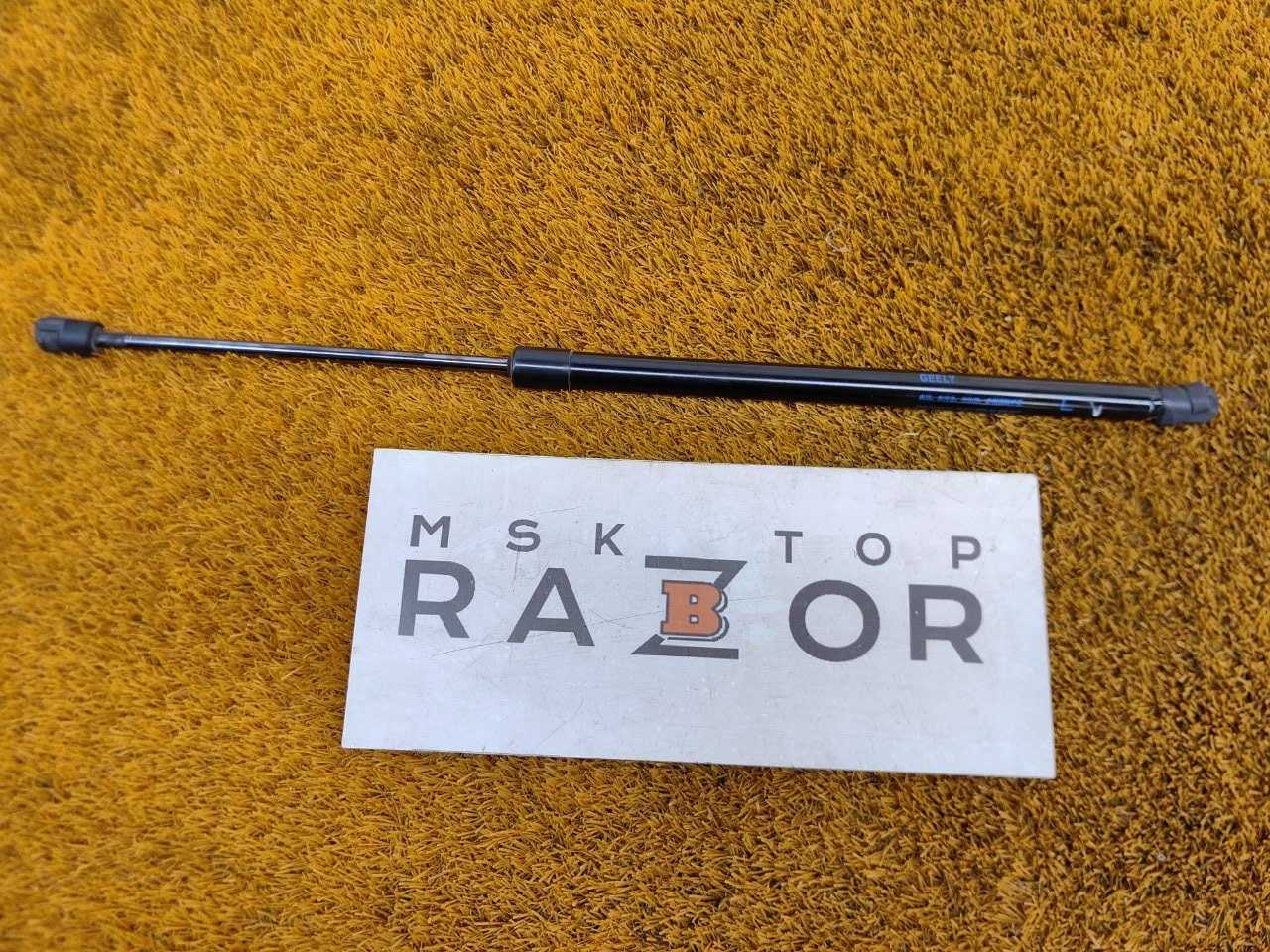 Амортизатор крышки багажника