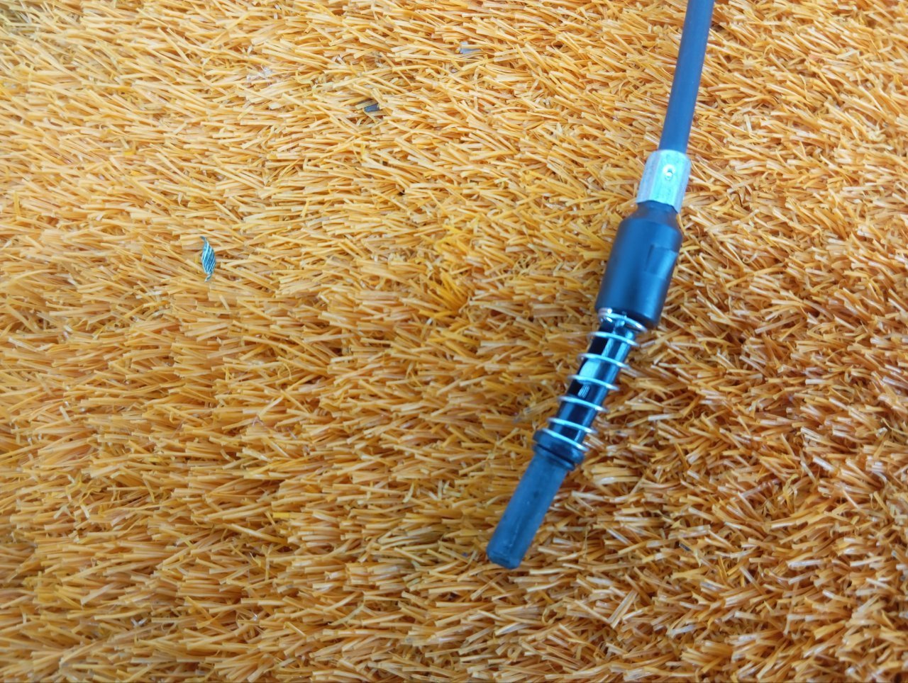 Трос лючка топливного бака