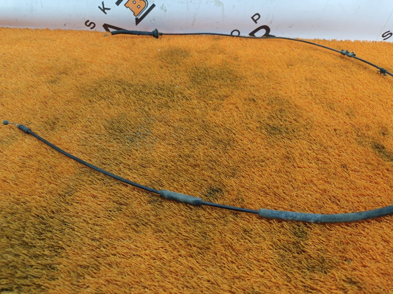 Трос замка капота