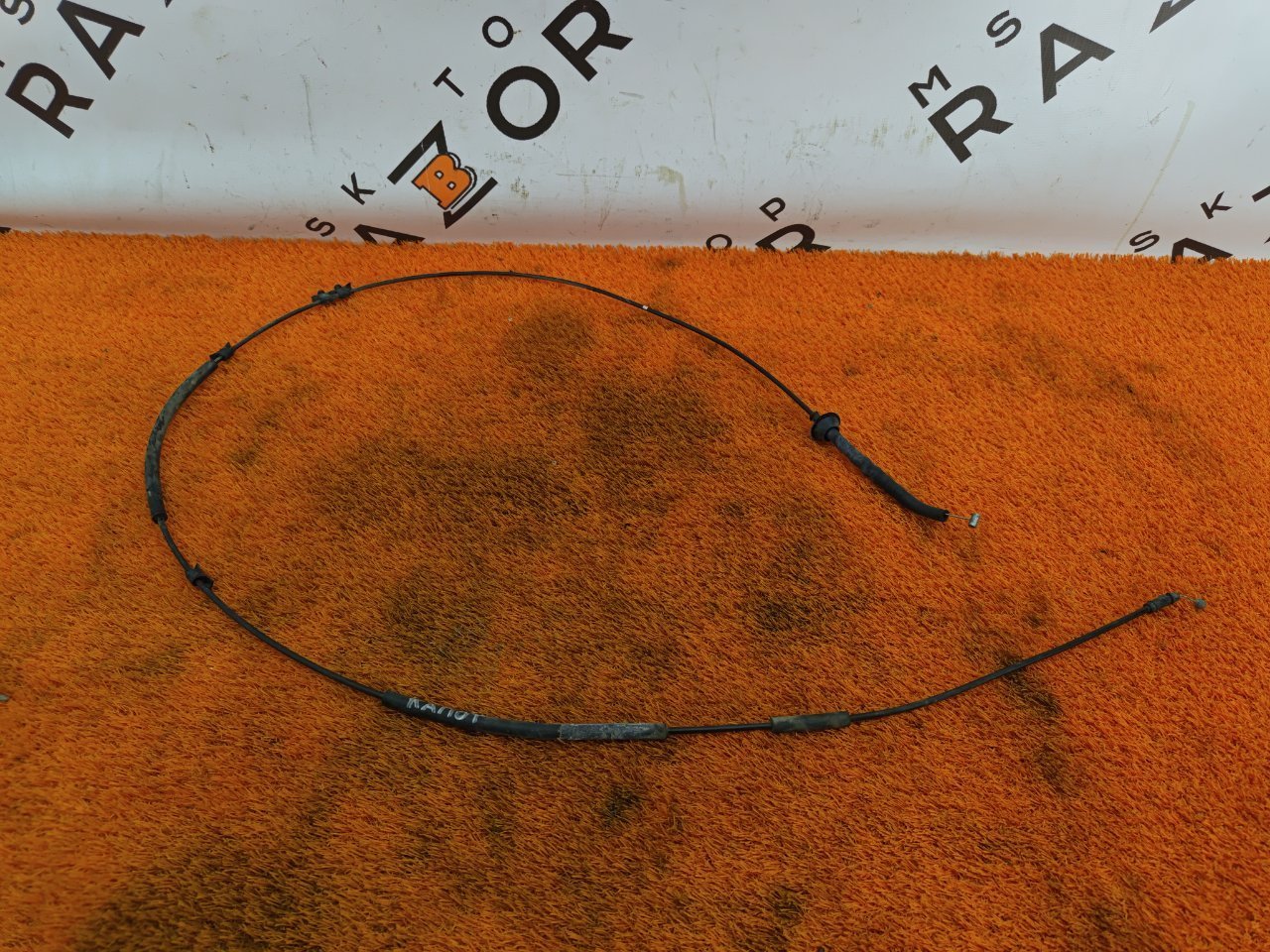 Трос замка капота