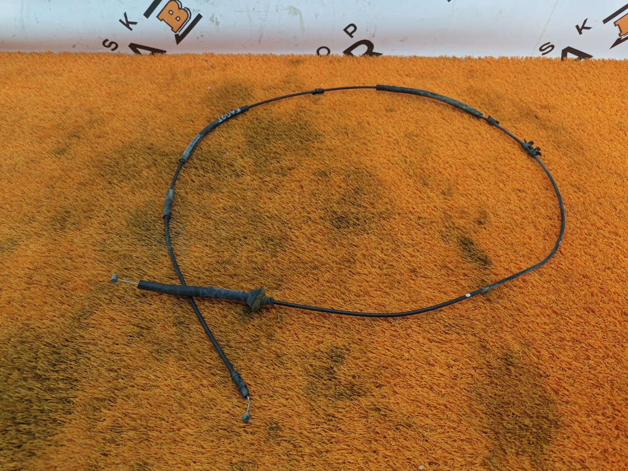 Трос замка капота